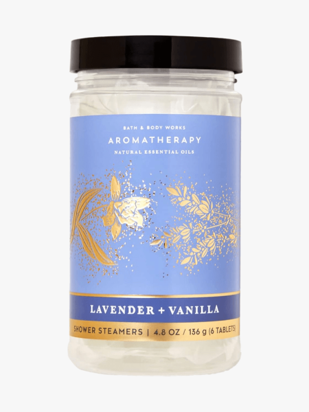 Bath and Body Works Lavender Vanilla Shower Steamers in branded jar component with black cap on a light gray background